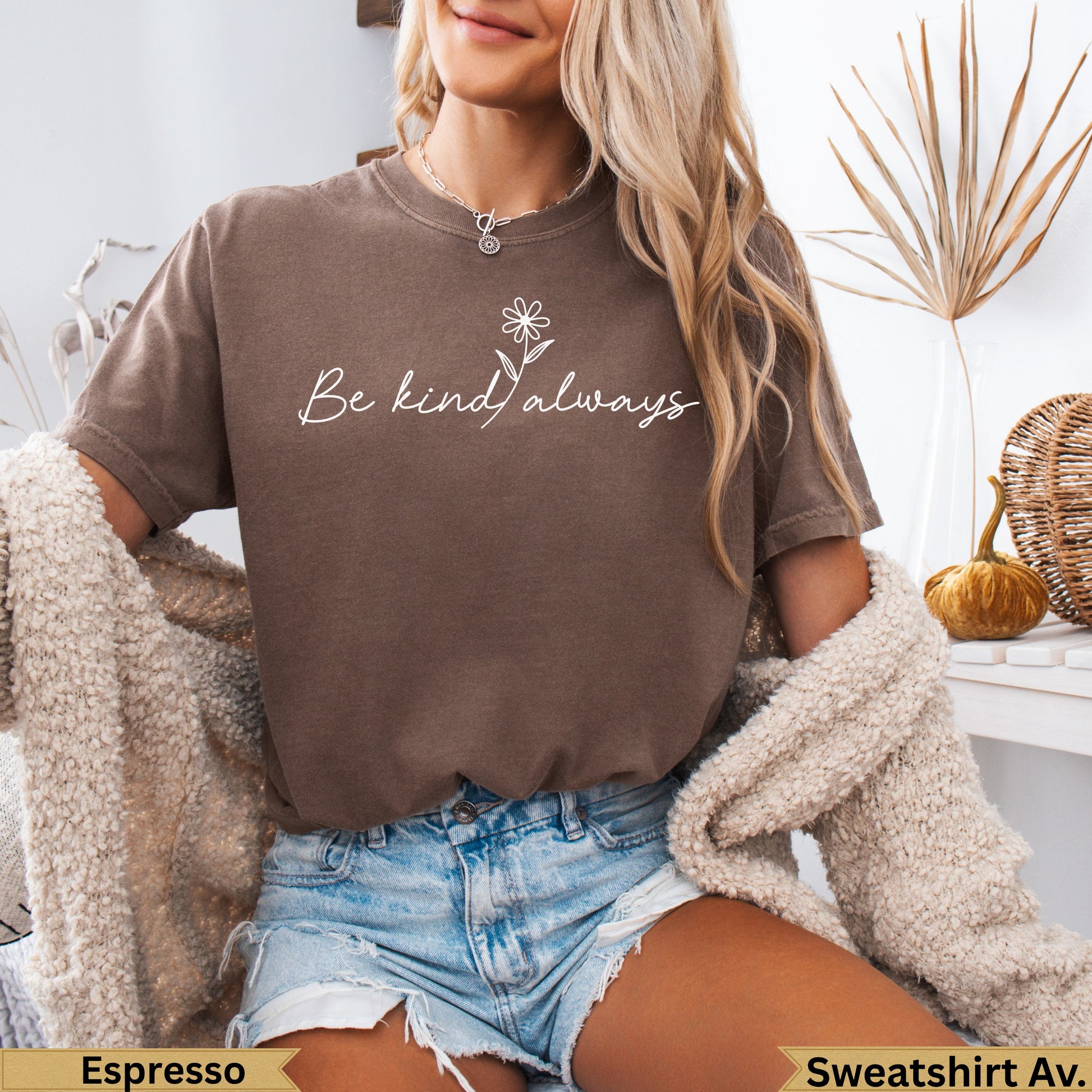 Brown t-shirt with "Be kind always" text and a daisy graphic.