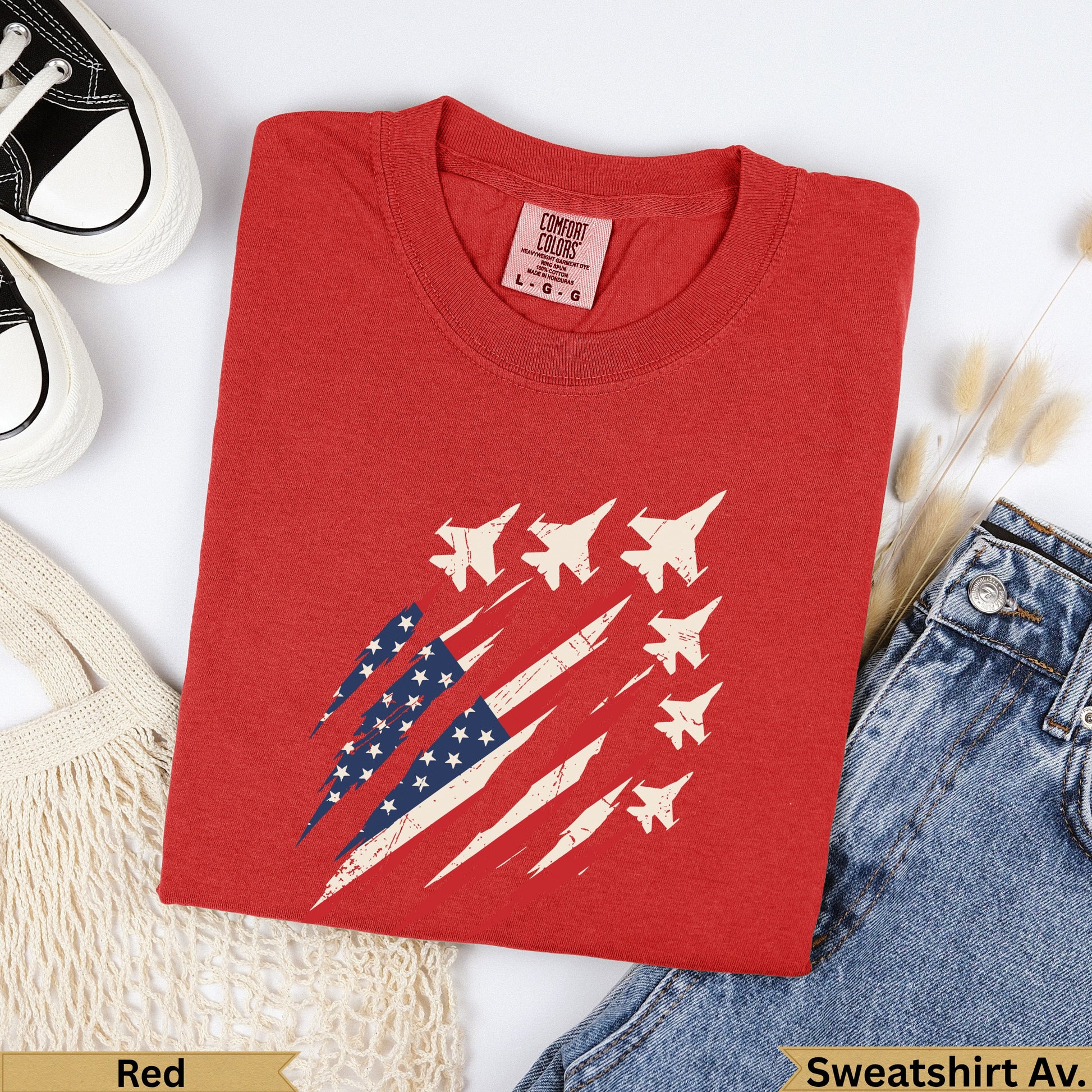 Red t-shirt with distressed American flag and fighter jets graphic.