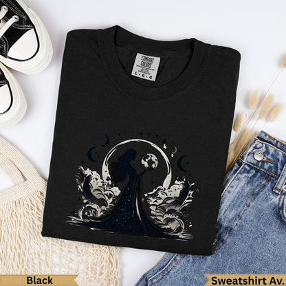 Black Comfort Colors sweatshirt with crescent moon, stars, and celestial woman graphic.