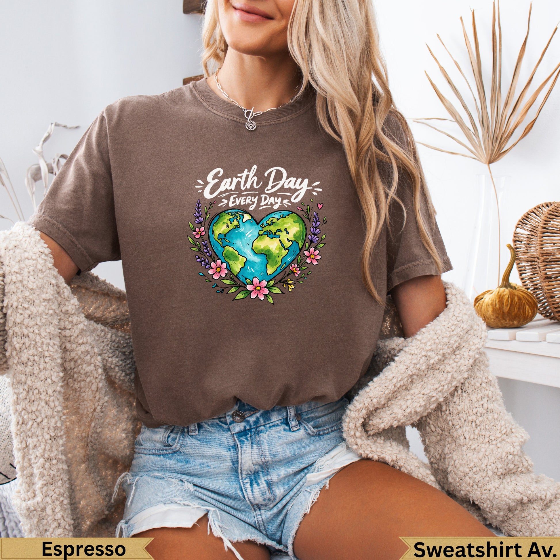 Earth Day Every Day graphic on a brown t-shirt with floral heart Earth illustration.