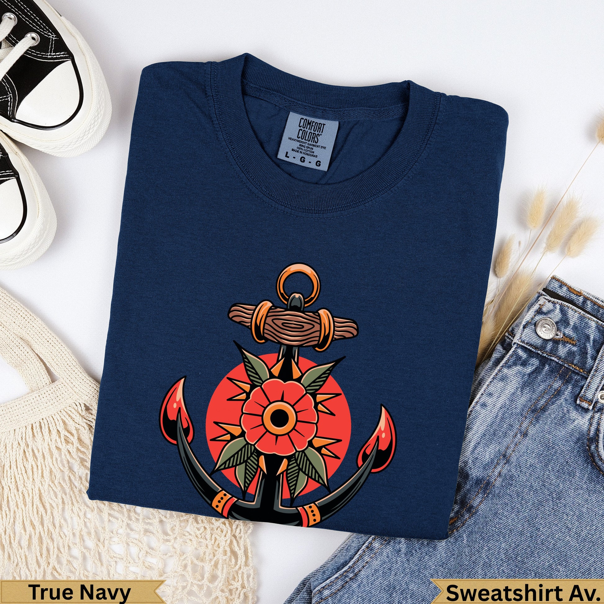 Navy blue t-shirt with vintage anchor and flower graphic.