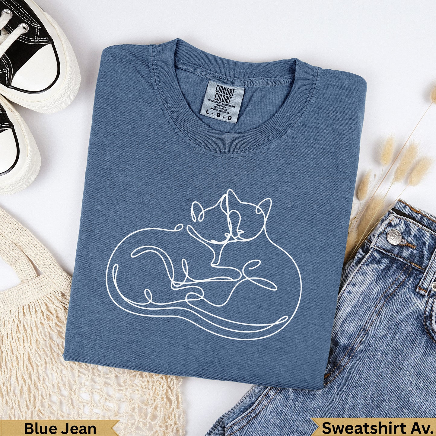 Blue Jean Comfort Colors sweatshirt with white line art of two cats.