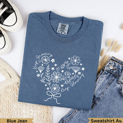 Blue Jean Comfort Colors sweatshirt with a white heart floral design and text.