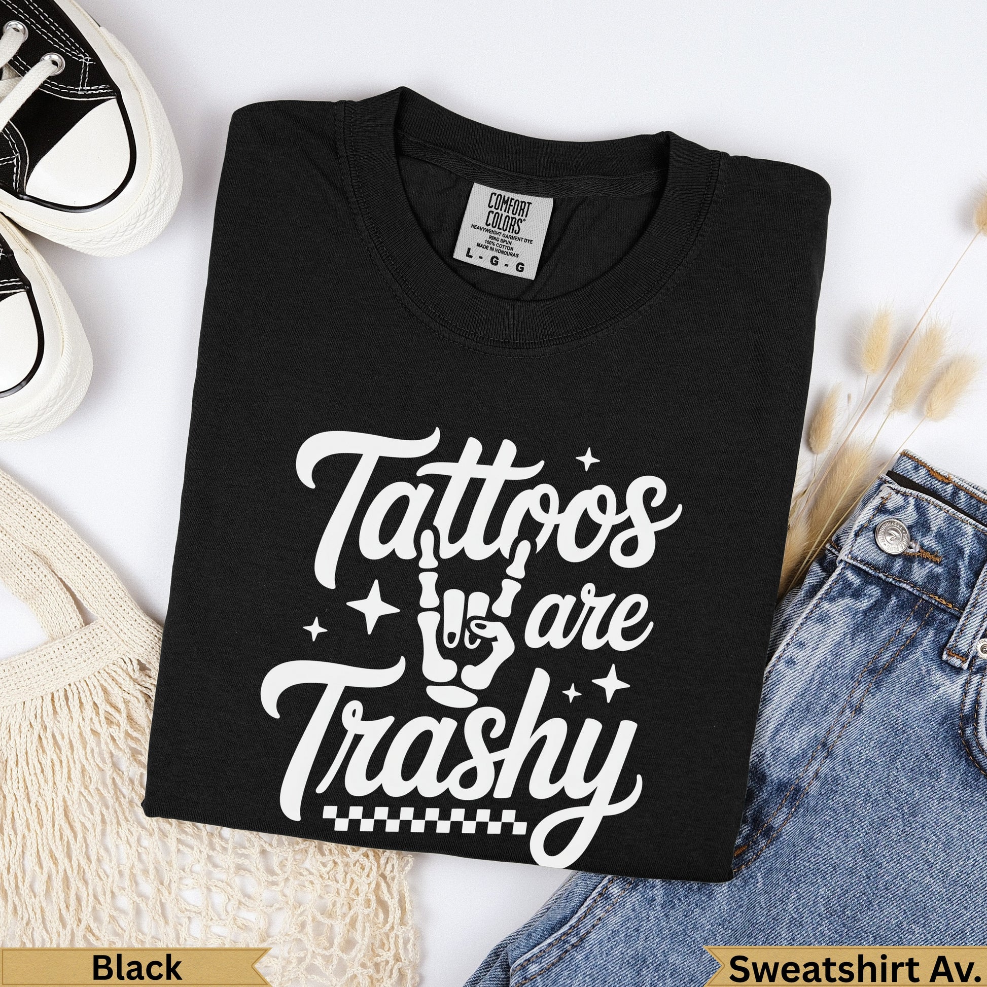 Black Comfort Colors t-shirt with white text "Tattoos are Trashy".
