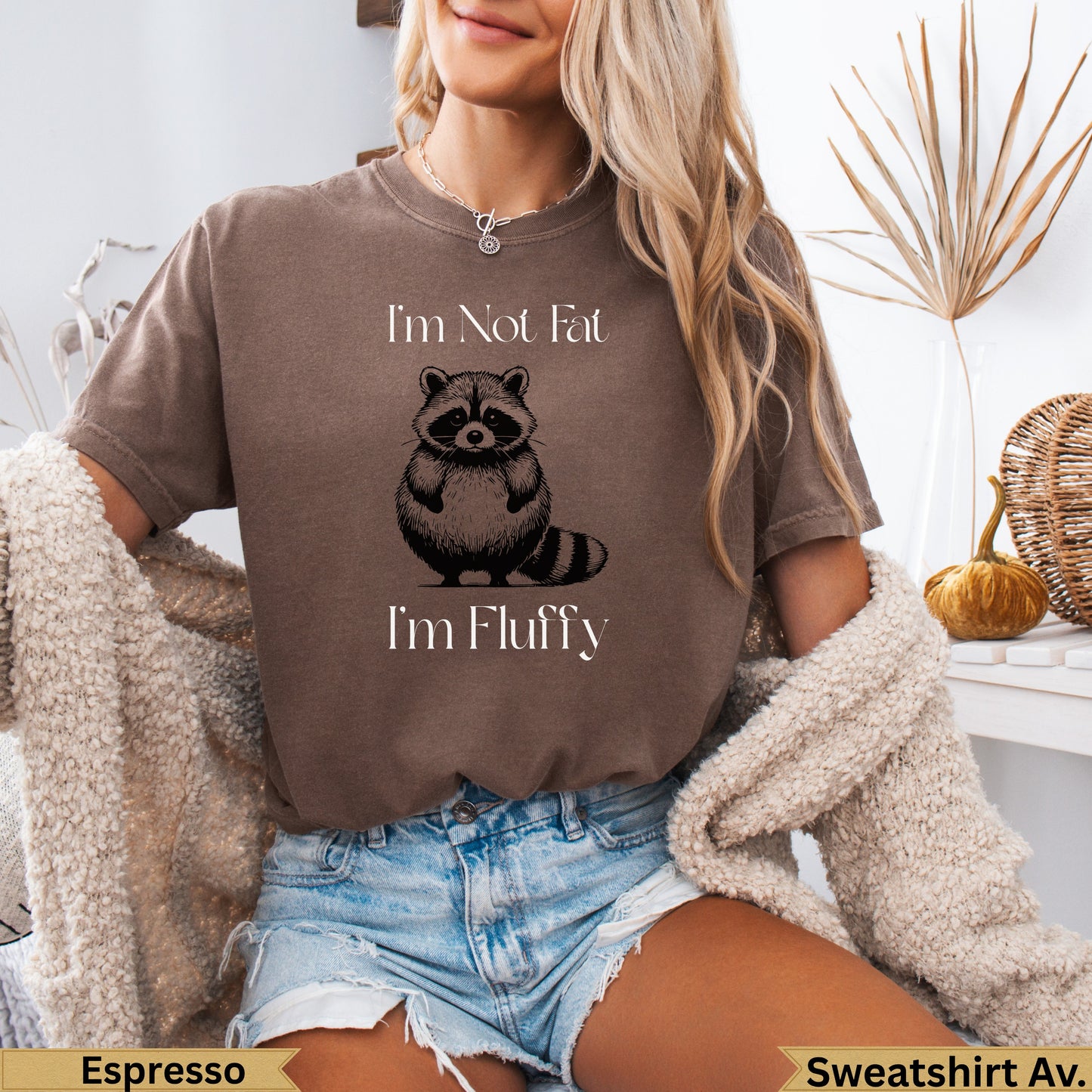 Brown t-shirt with raccoon graphic and text "I'm Not Fat I'm Fluffy".