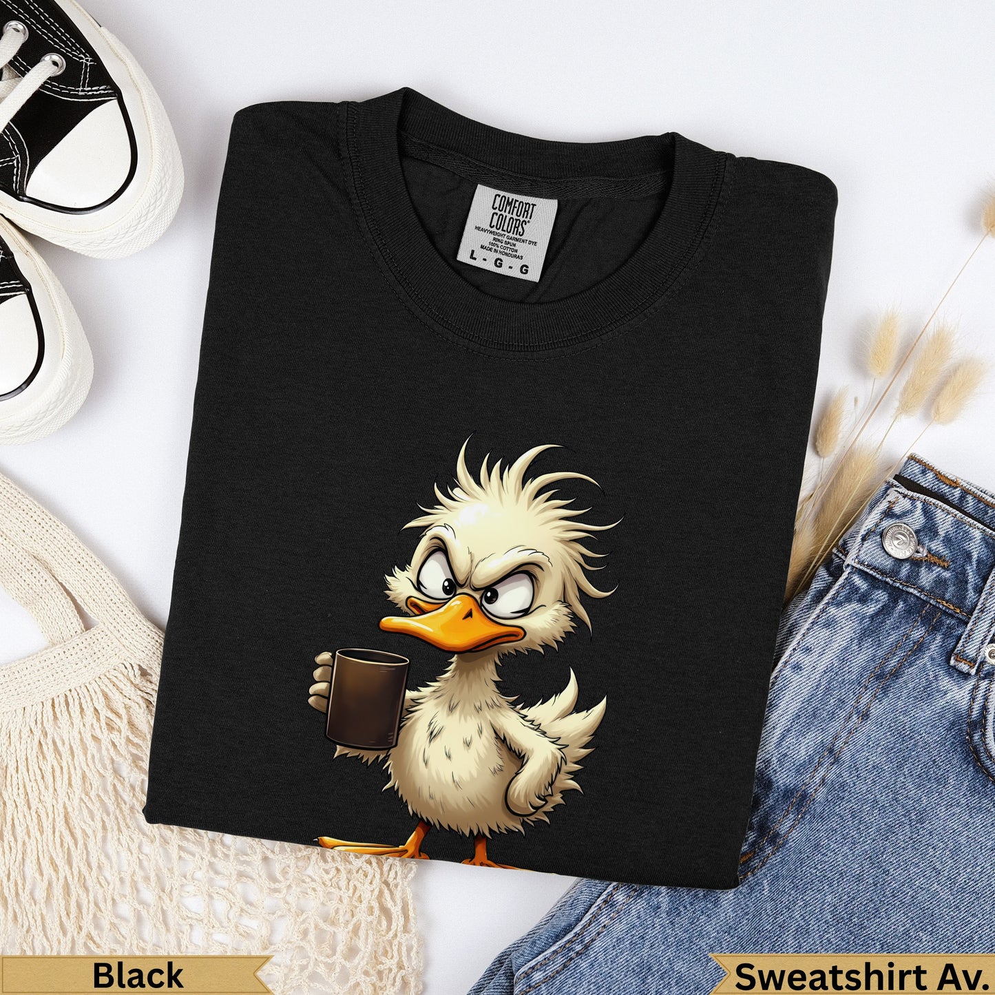 Black t-shirt with cartoon duck holding a coffee mug.