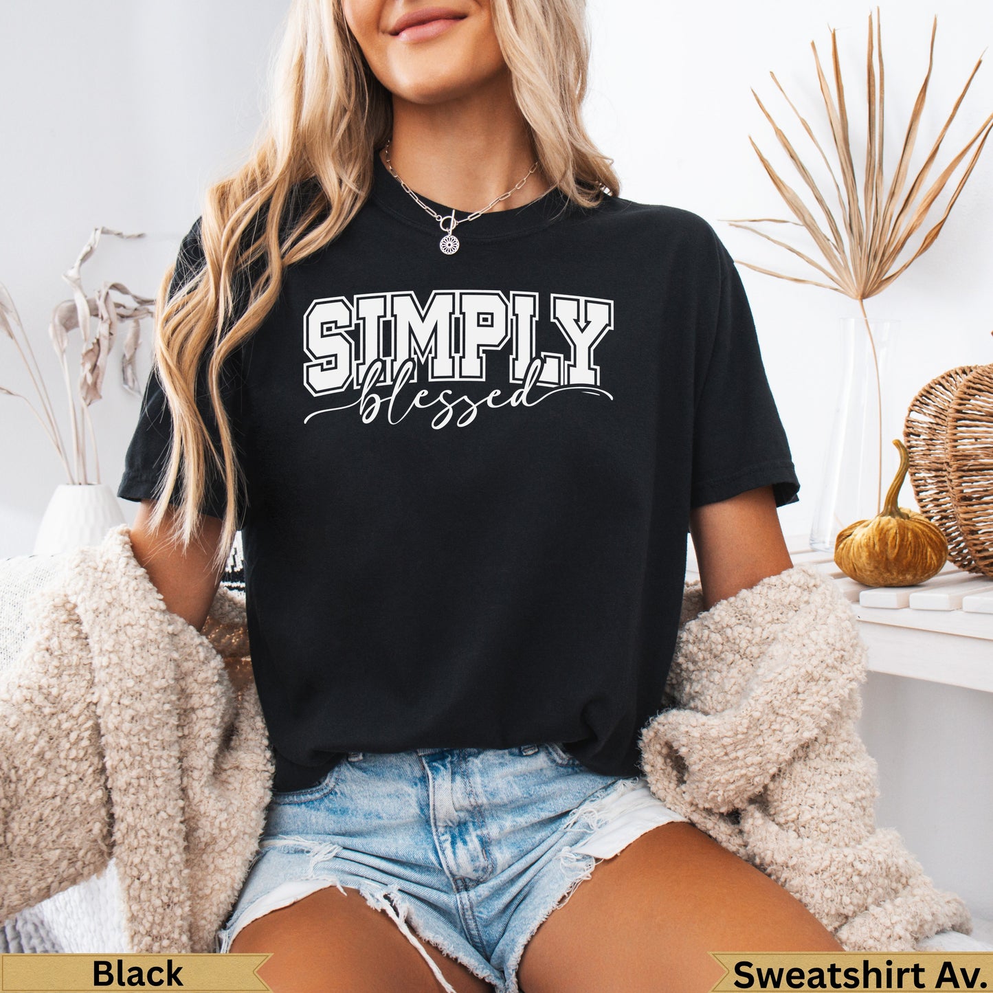 Black crewneck t-shirt with "SIMPLY blessed" text.