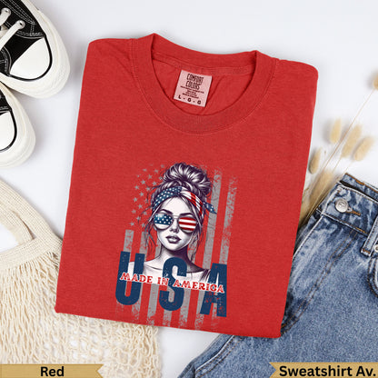 Red crewneck sweatshirt with "USA" and American flag styled woman graphic.