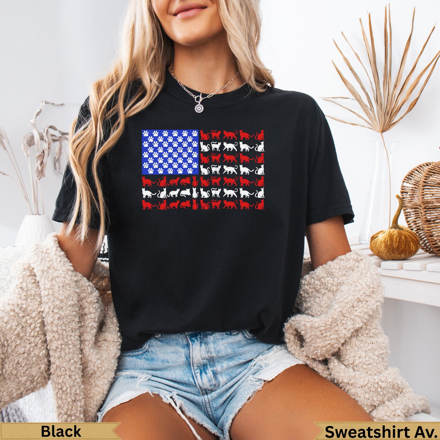 Black t-shirt with American flag design made of red and white cats.