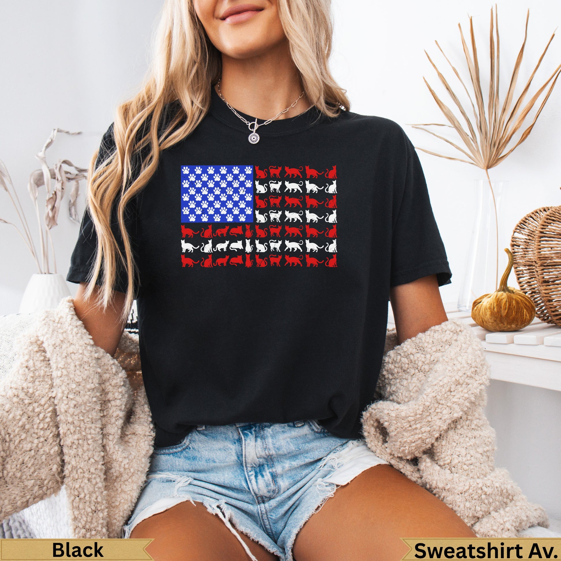 Black t-shirt with American flag design made of red and white cats.