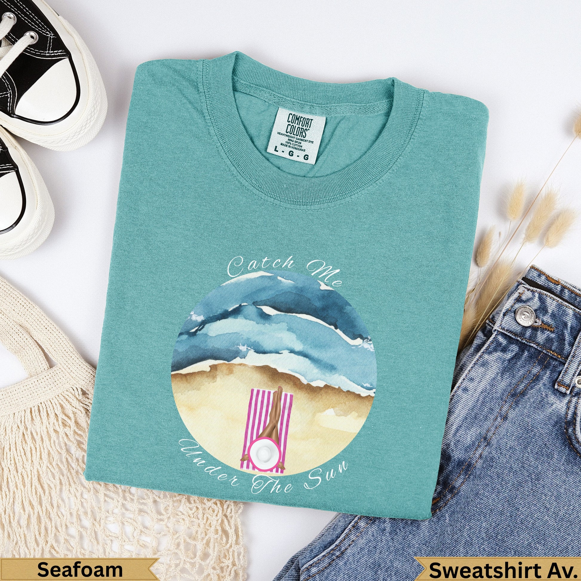 Seafoam Comfort Colors sweatshirt with "Catch Me Under the Sun" beach graphic.