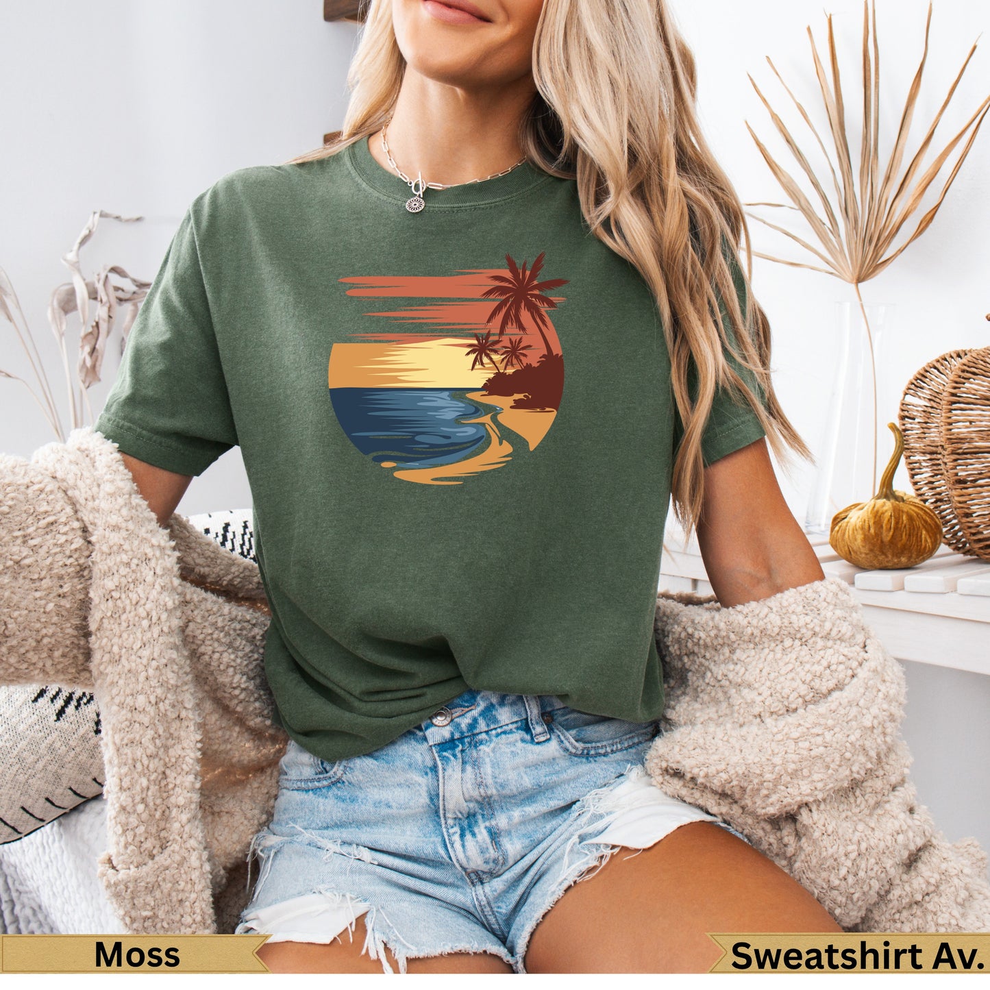 T-shirt with a sunset beach graphic and palm trees.