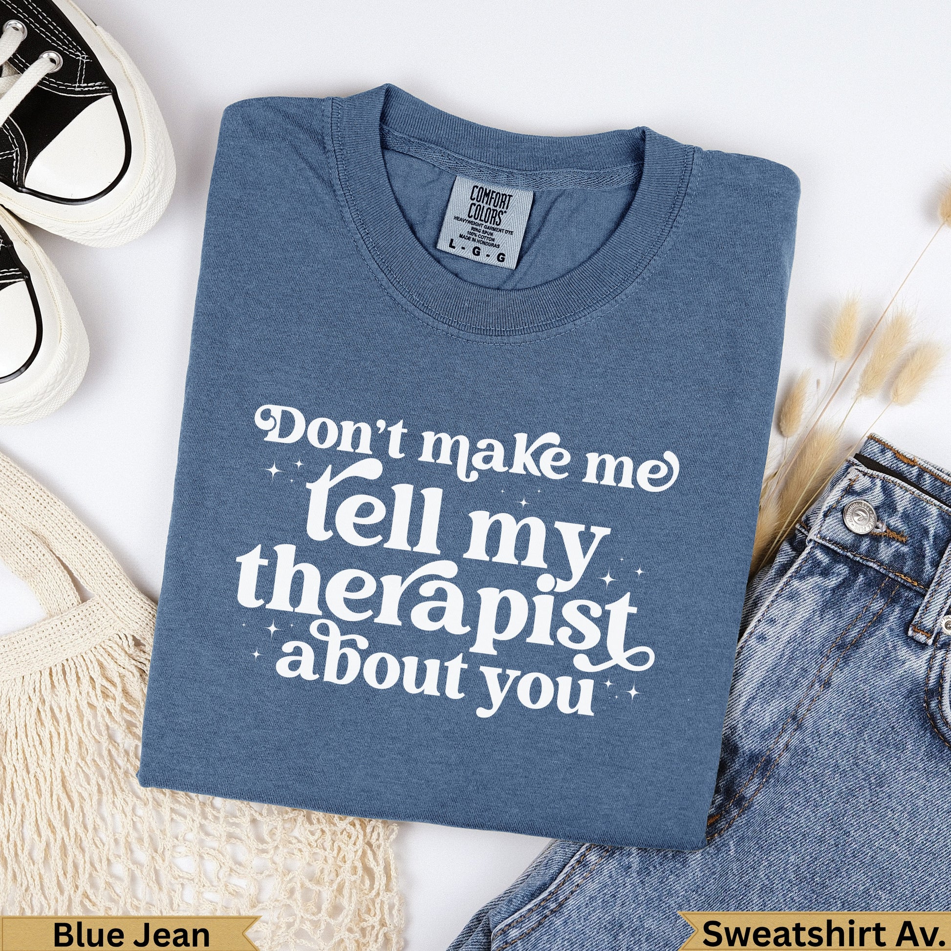 Blue Jean sweatshirt with "Don't make me tell my therapist about you" text.