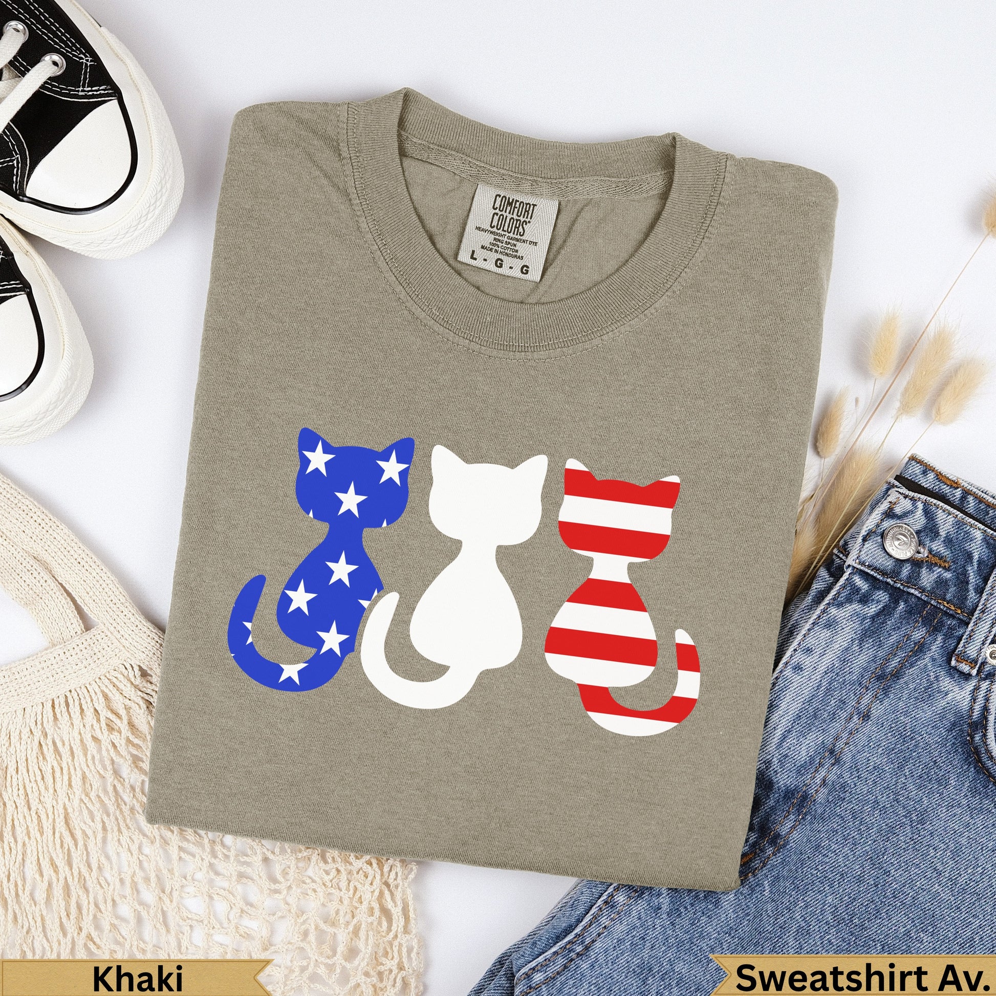 Khaki sweatshirt with three patriotic cats: blue with stars, white, and red striped.