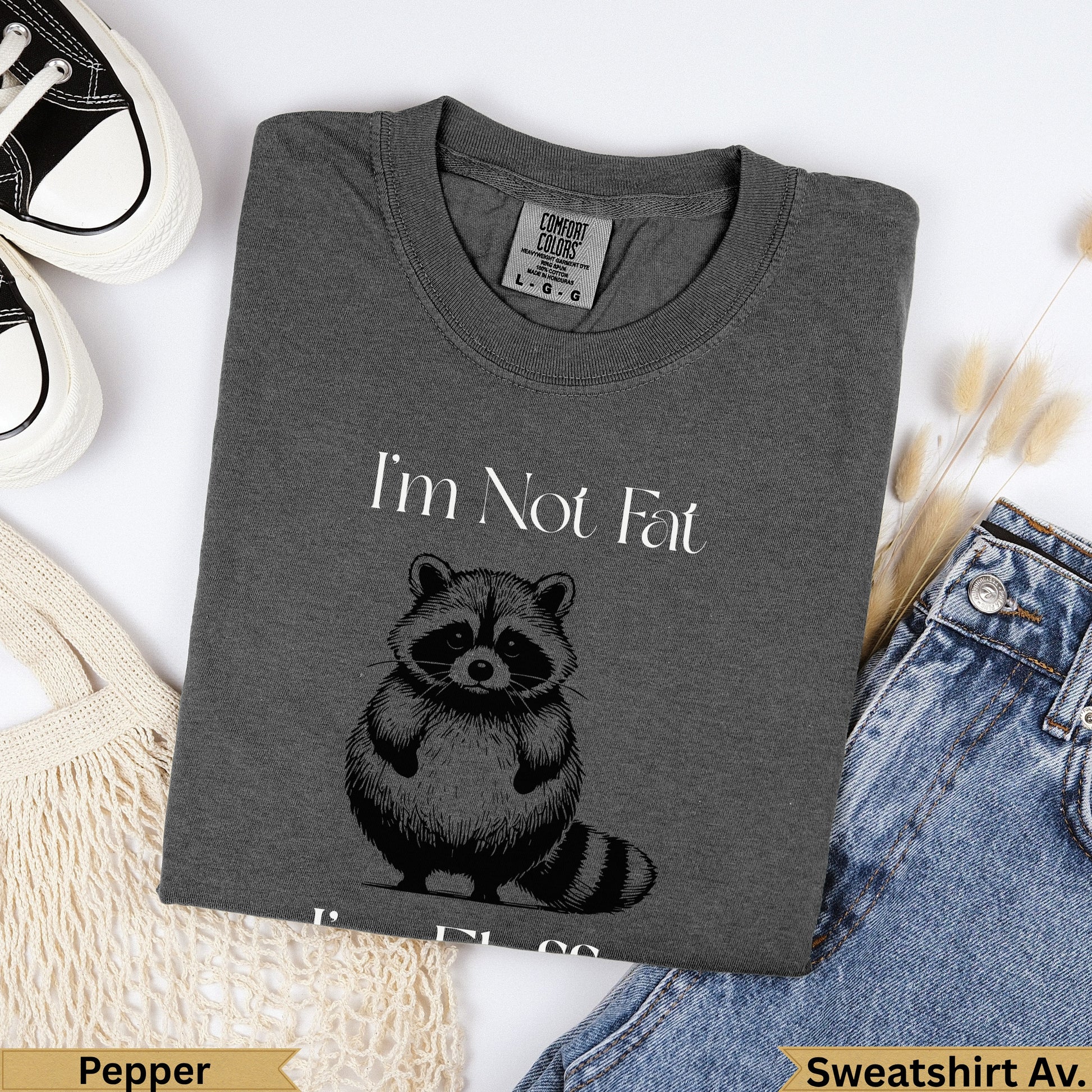 Dark grey Comfort Colors sweatshirt with raccoon graphic and "I'm Not Fat" text.