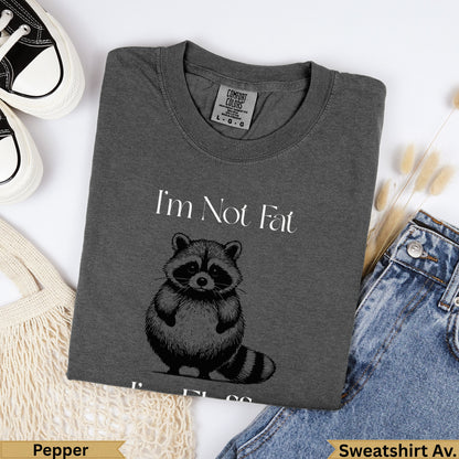 Dark grey Comfort Colors sweatshirt with raccoon graphic and "I'm Not Fat" text.