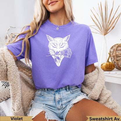 Purple t-shirt with white wolf and rose graphic.