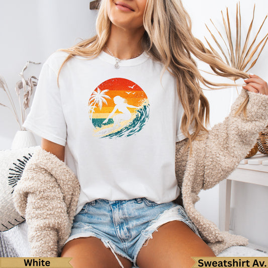 Woman in white t-shirt with retro sunset surf graphic and text "White Sweatshirt Av."