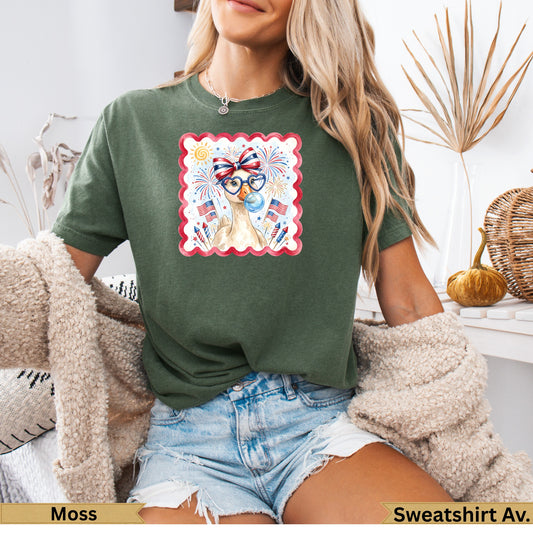 Green t-shirt with patriotic llama graphic and fireworks.