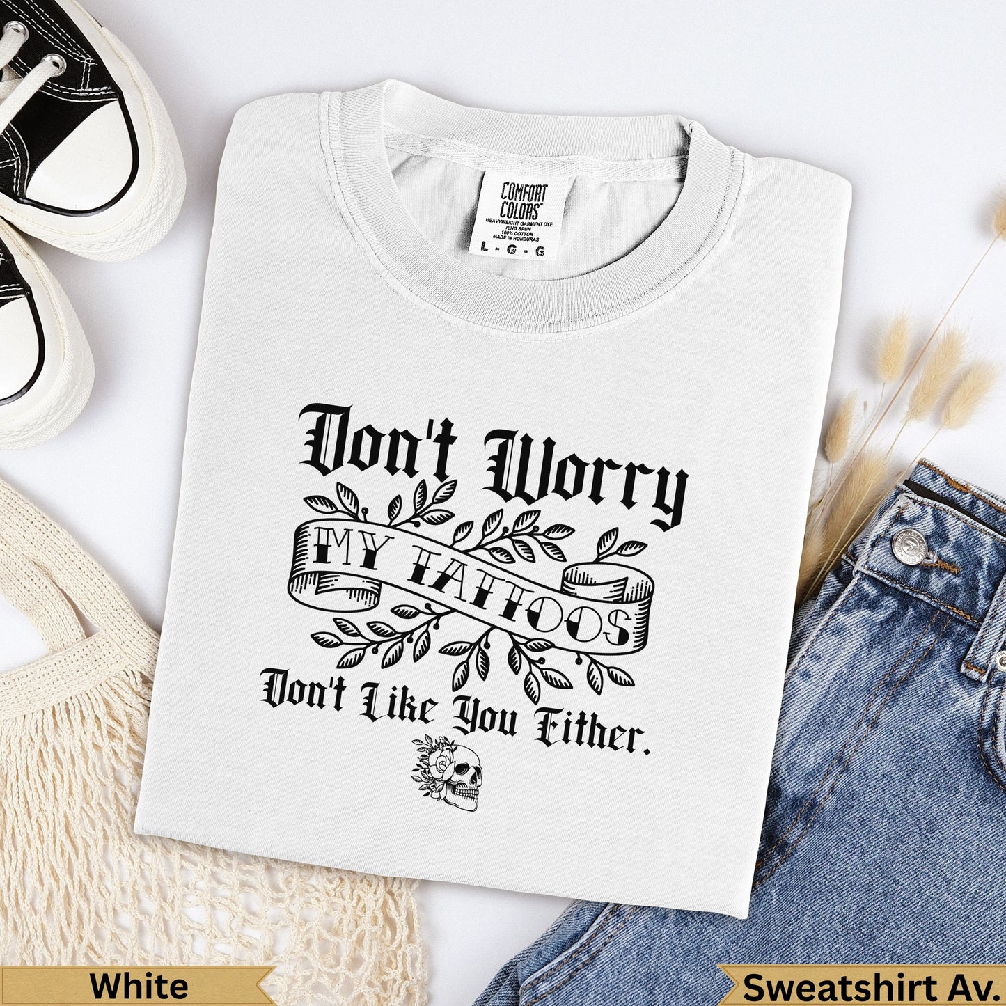 White Comfort Colors heavyweight t-shirt with "Don't Worry My Tattoos Don't Like You Either" text.