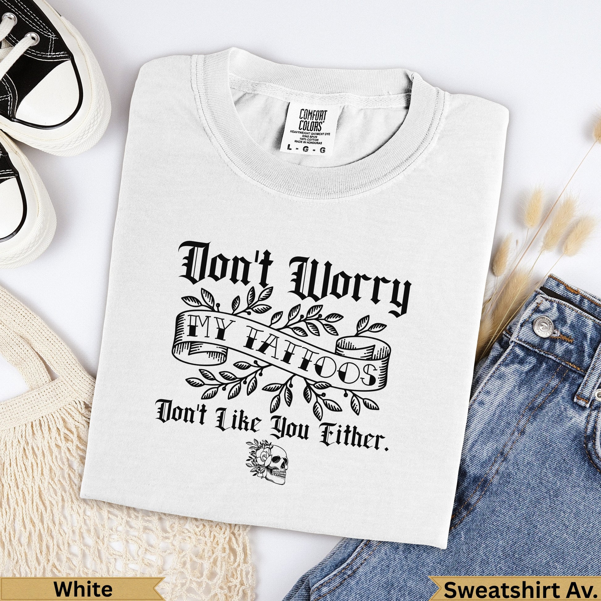 White Comfort Colors heavyweight t-shirt with "Don't Worry My Tattoos Don't Like You Either" text.