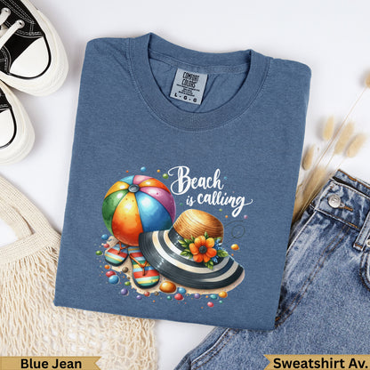 Blue Jean sweatshirt with "Beach is Calling" graphic featuring a beach ball and hat.