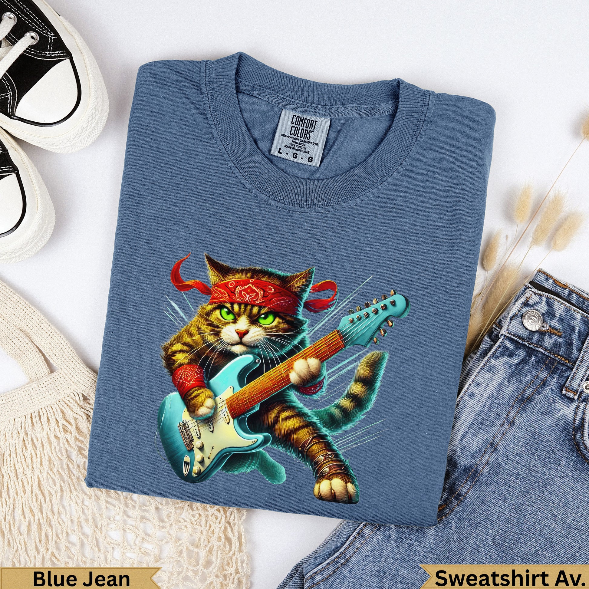 Blue Jean sweatshirt with a cat wearing a bandana playing a guitar.