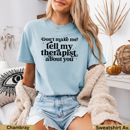 Light blue t-shirt with "Don't make me tell my therapist about you" text.