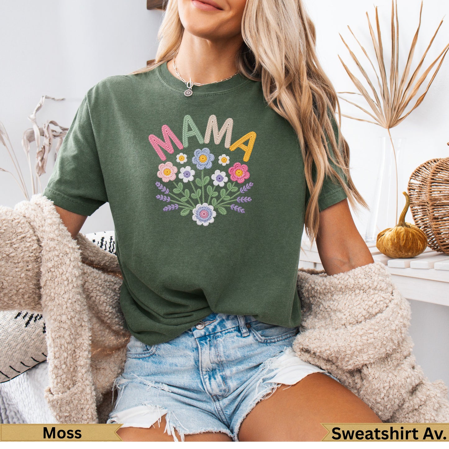 Green t-shirt with embroidered "MAMA" and floral design.