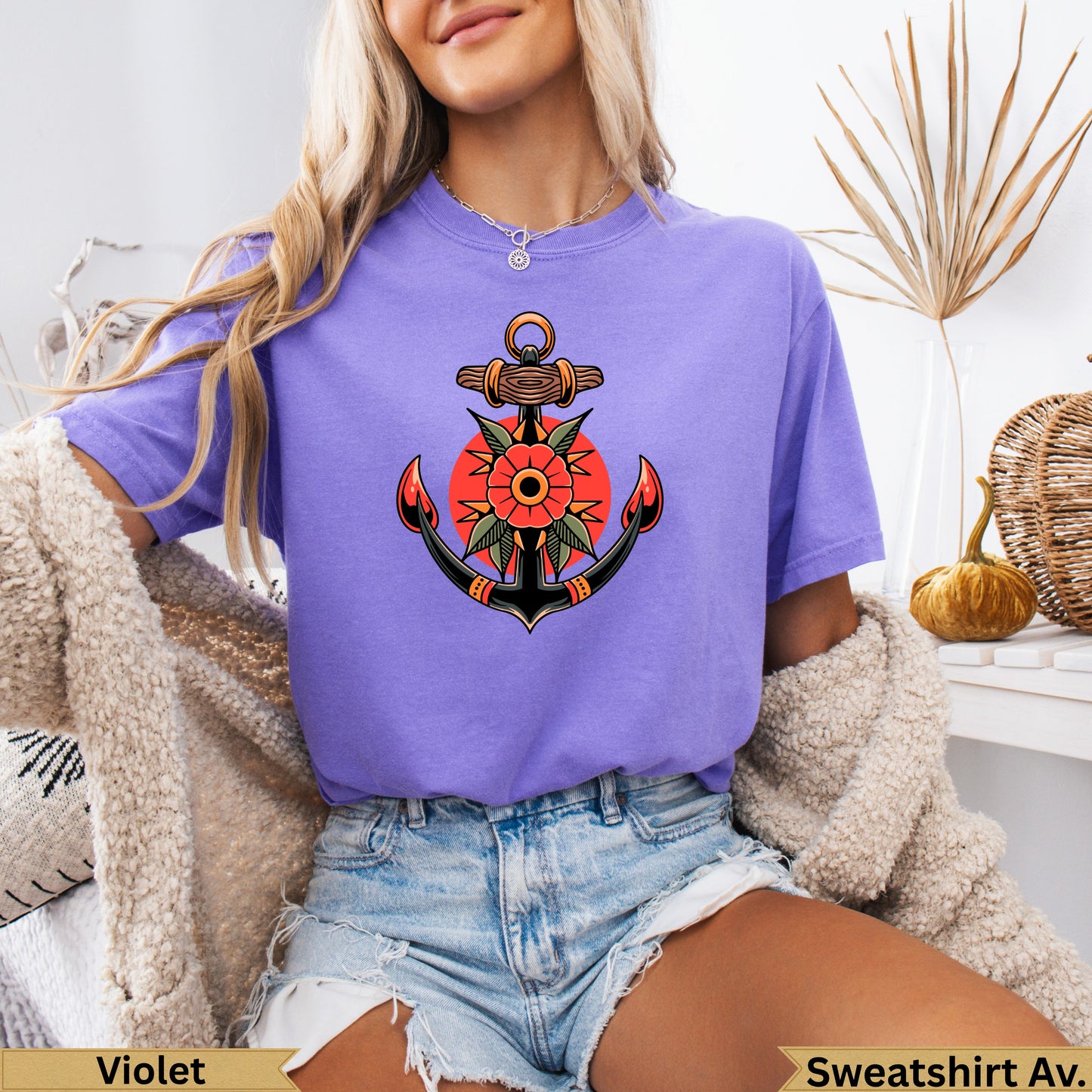 Purple t-shirt with anchor and sun tattoo design.