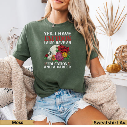 Green t-shirt with "Yes, I have tattoos, I also have an education and a career" text.