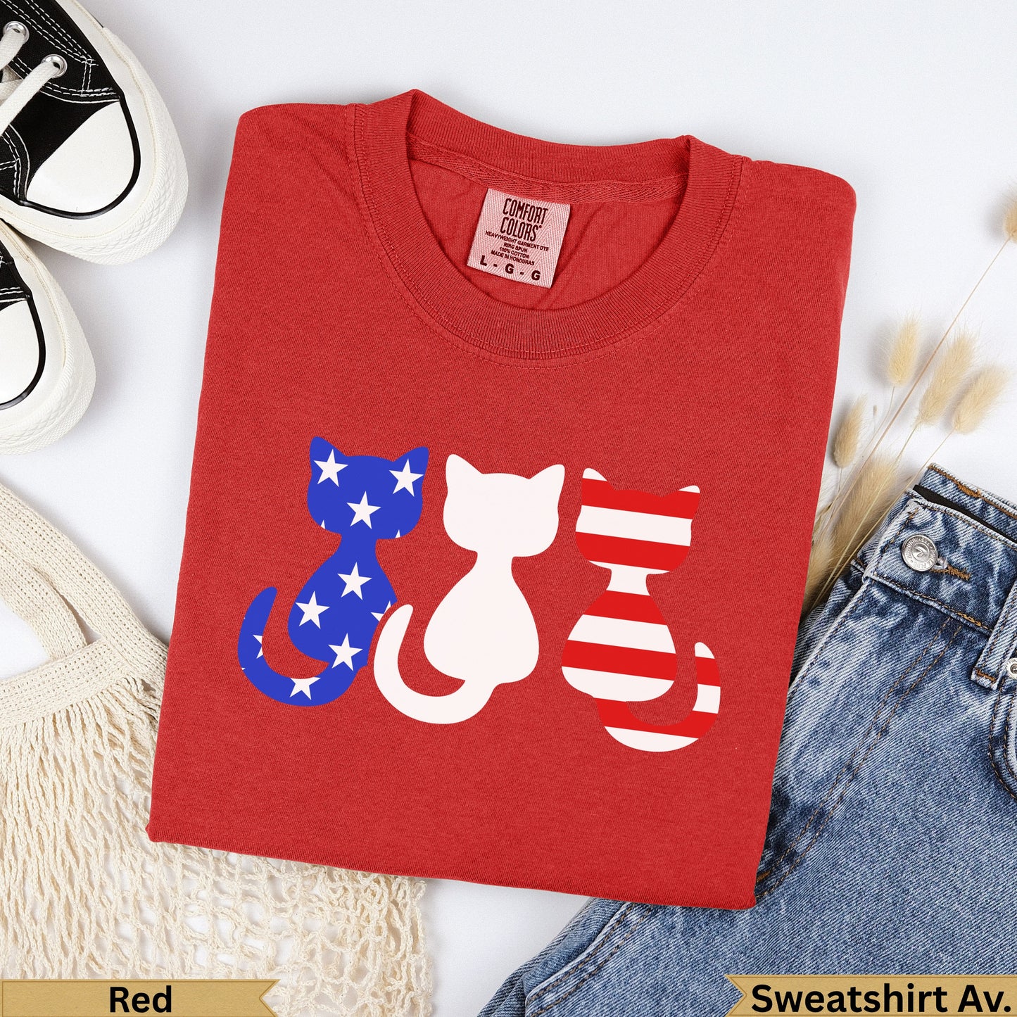 Red t-shirt with three patriotic cats: one star-spangled, one plain white, one striped.