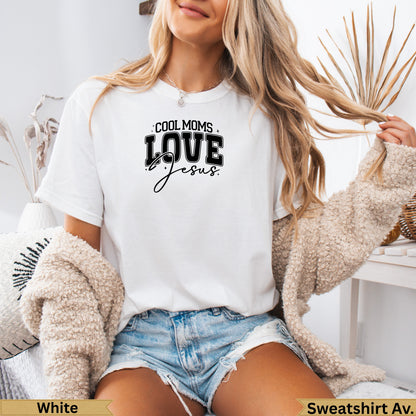 White crewneck sweatshirt with "COOL MOMS LOVE Jesus" text.