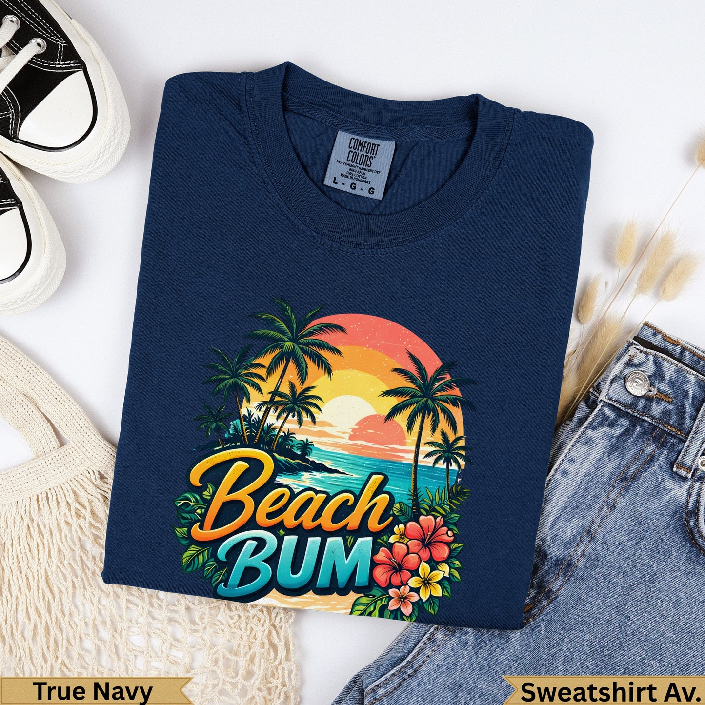 Navy blue crewneck sweatshirt with "Beach Bum" text and tropical scene graphic.