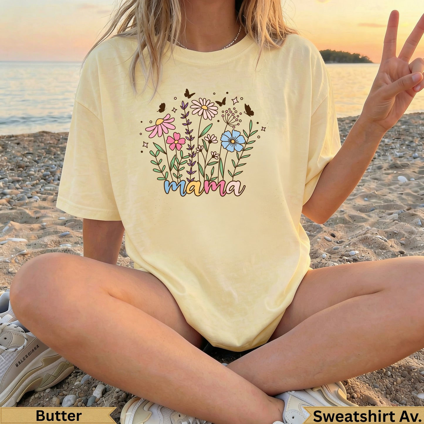 Light yellow "Mama" t-shirt with floral and butterfly graphic.