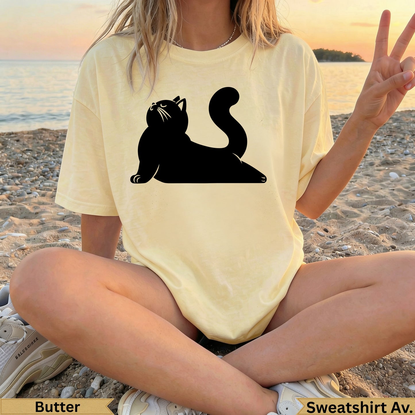 Yellow t-shirt with a black cat silhouette and "Butter" text.