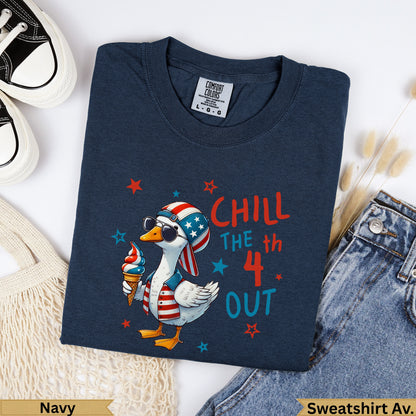 Navy sweatshirt with a cartoon duck in a cone hat, sunglasses, and ice cream.