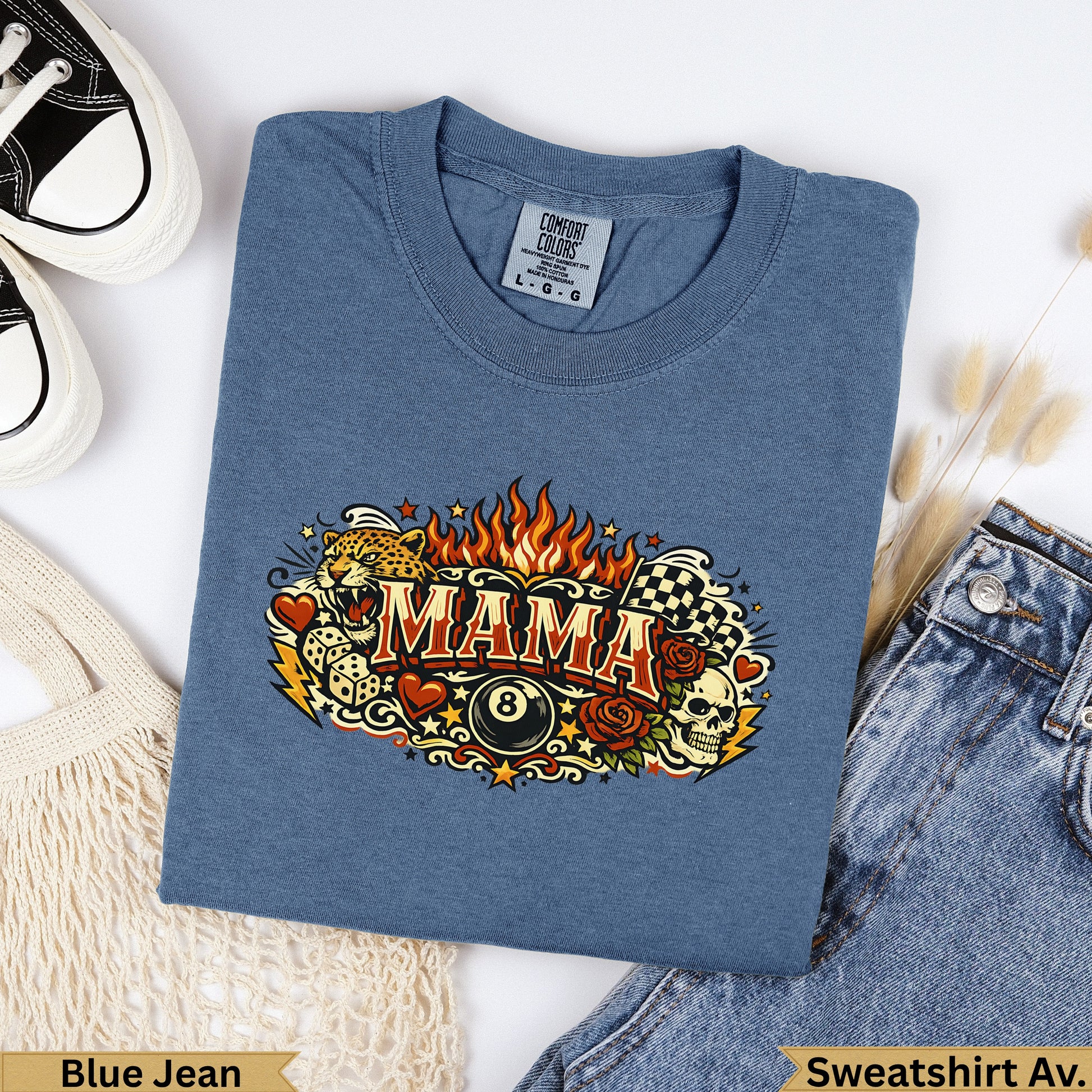 Blue Jean Comfort Colors sweatshirt with "MAMA" graphic featuring skulls, roses, and a checkered flag.