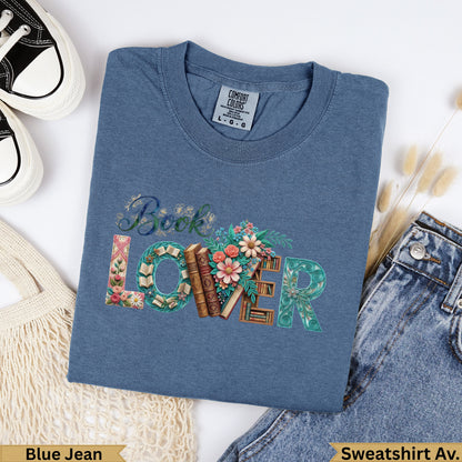 Blue t-shirt with "Book Lover" design featuring books and flowers.