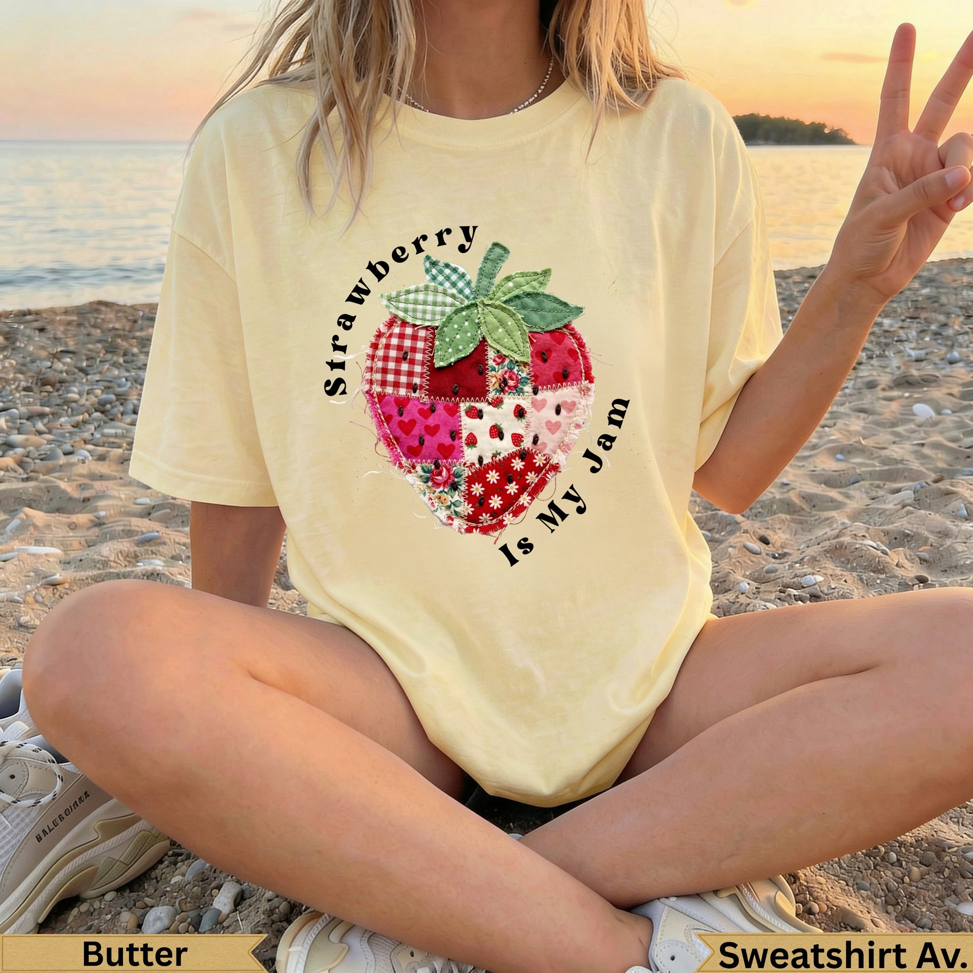 Yellow t-shirt with patchwork strawberry graphic and text "Strawberry Is My Jam".