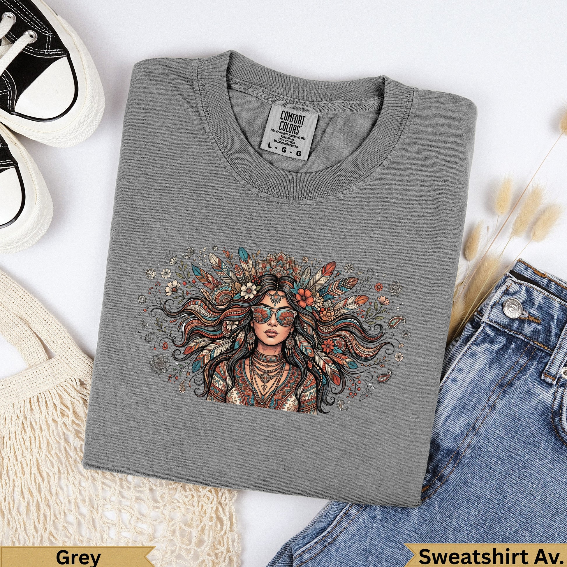 Grey sweatshirt with boho woman illustration and floral details.