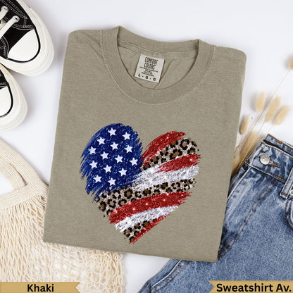Khaki sweatshirt with distressed American flag heart graphic.