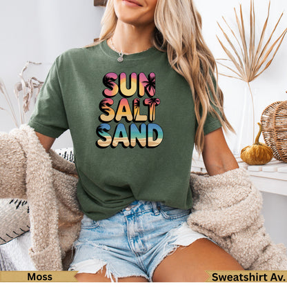 Olive green t-shirt with "SUN SALT SAND" text and palm trees.