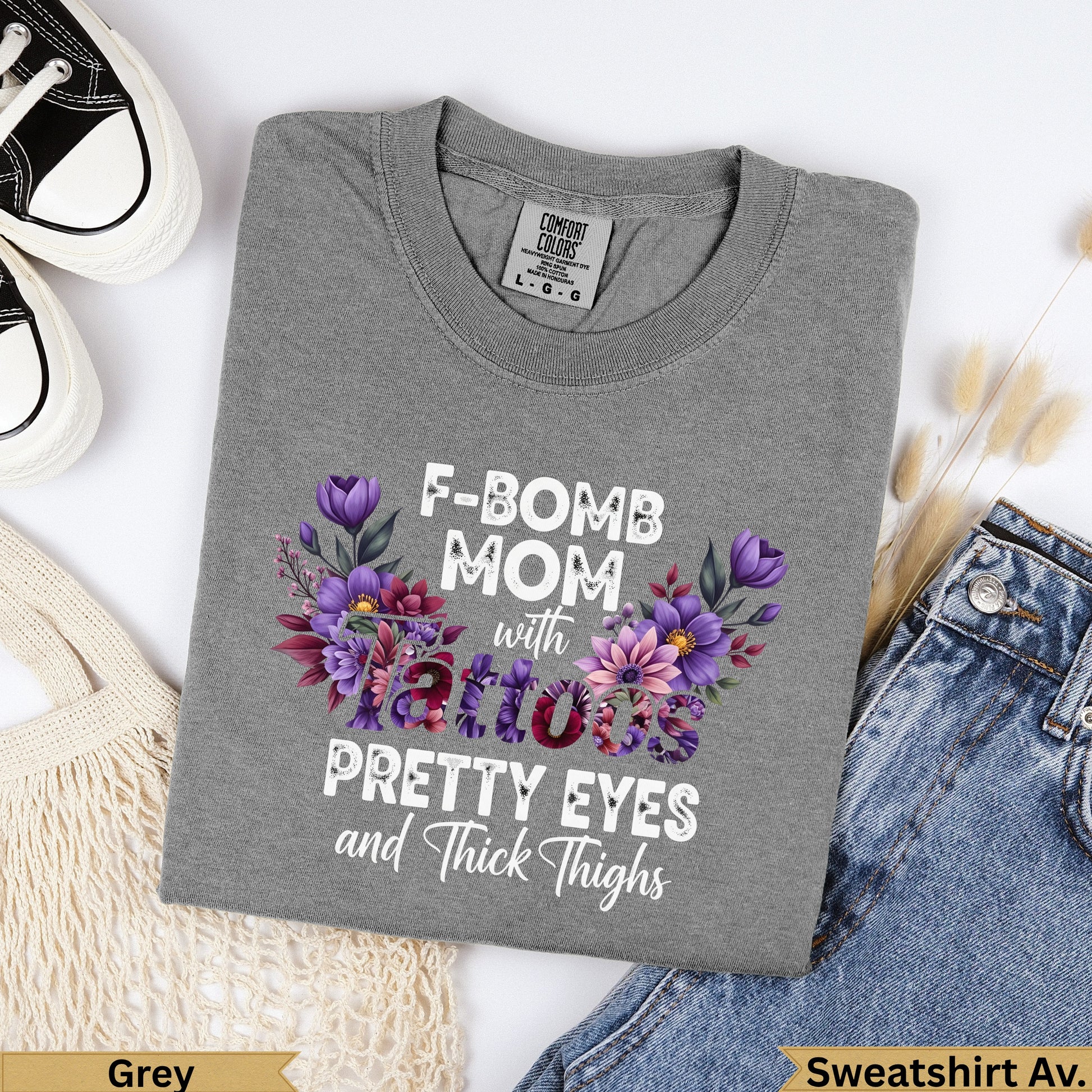 Grey sweatshirt with "F-Bomb Mom with Tattoos Pretty Eyes and Thick Thighs" text.