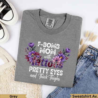 Grey sweatshirt with "F-Bomb Mom with Tattoos Pretty Eyes and Thick Thighs" text.