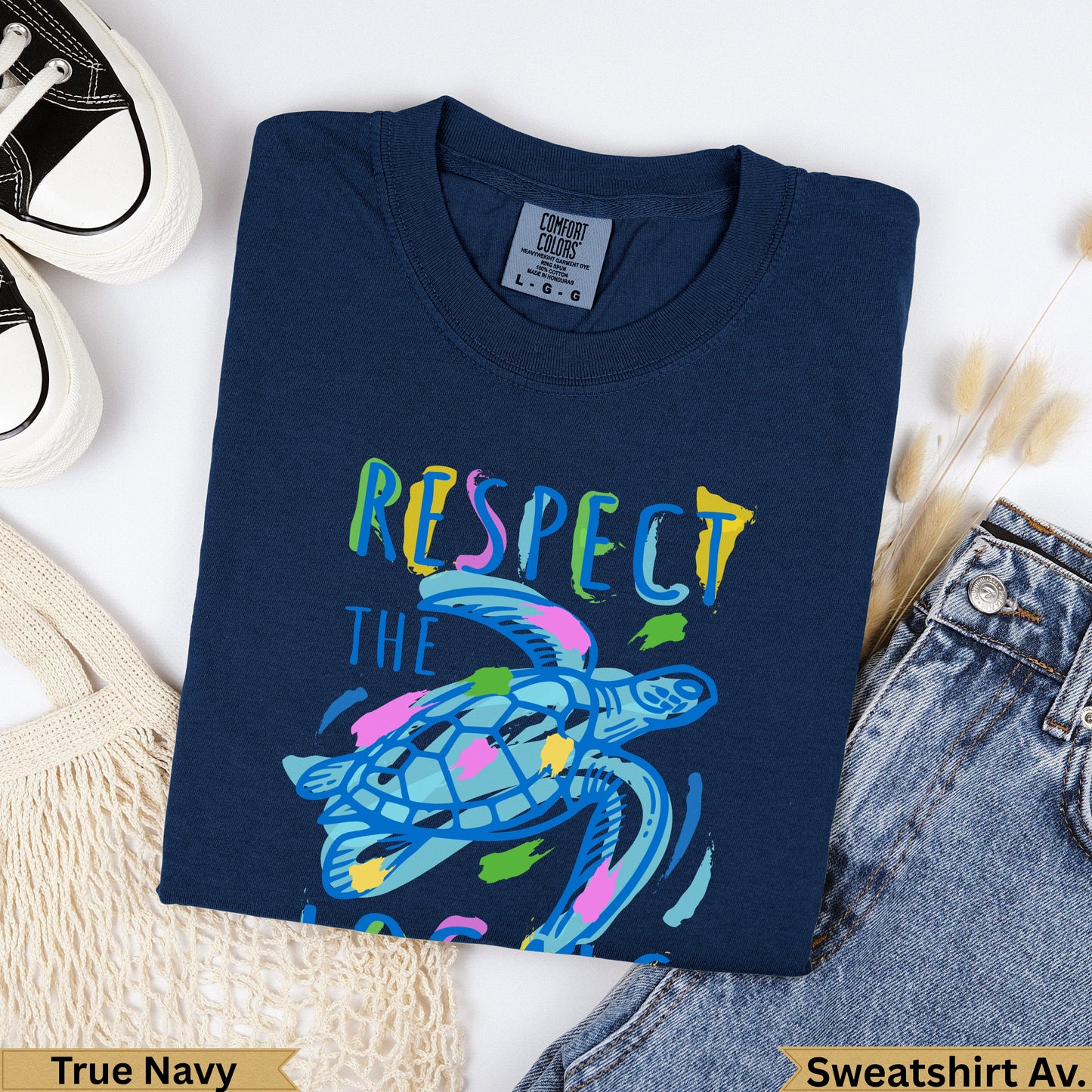 Navy sweatshirt with colorful sea turtle graphic and "RESPECT THE" text.