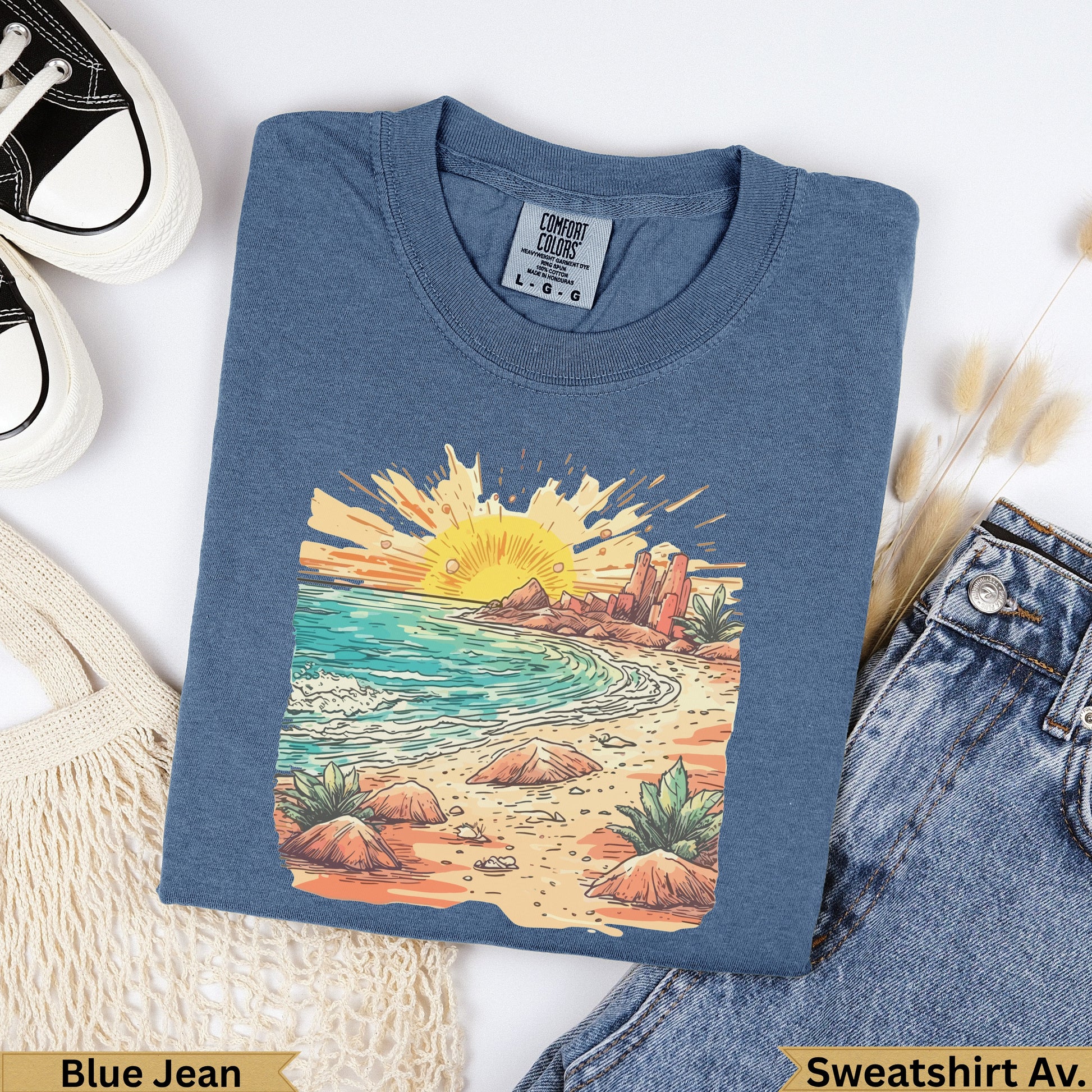 Blue denim sweatshirt with a beach sunset graphic and "Blue Jean Sweatshirt Av." text.