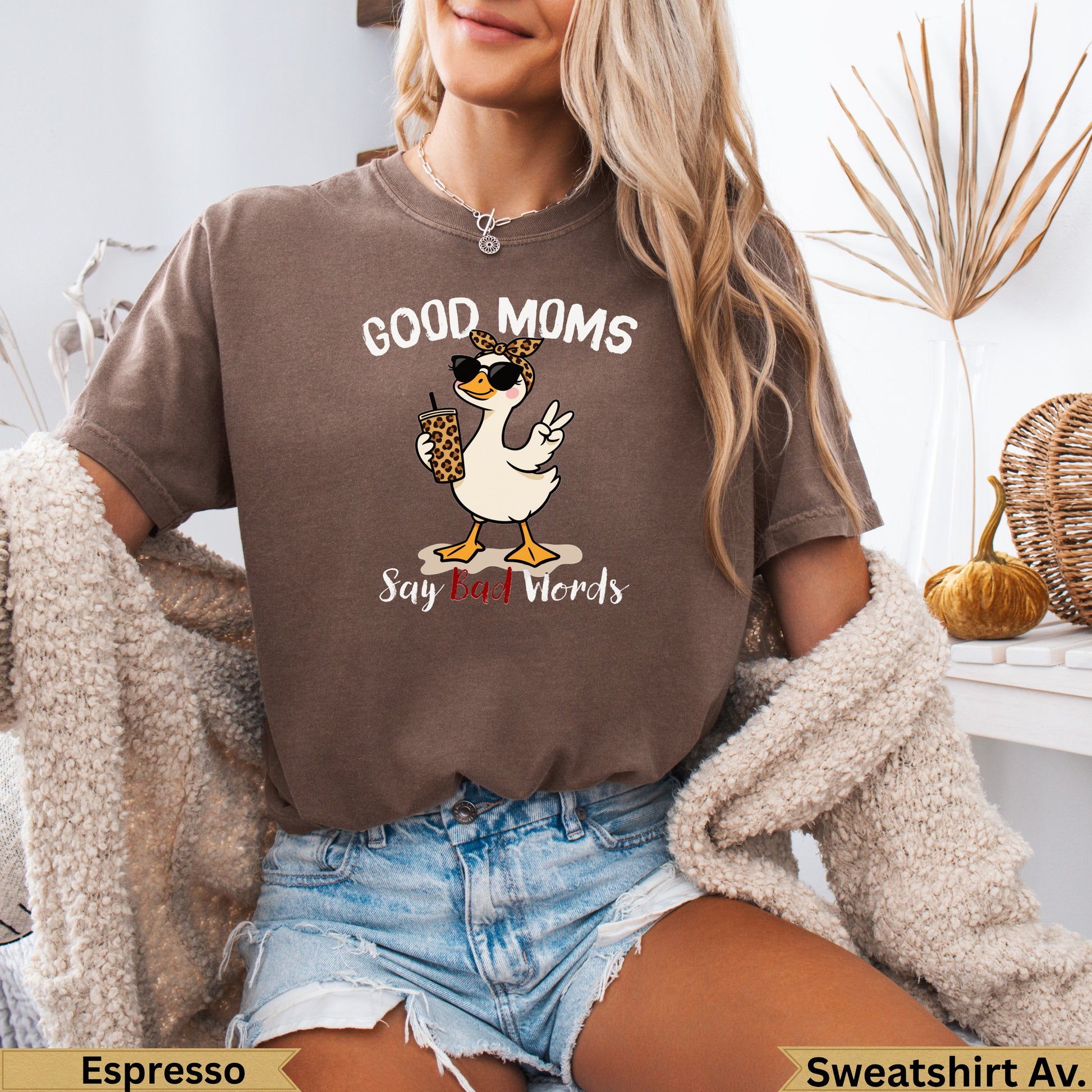 Brown t-shirt with duck wearing sunglasses saying "Good Moms Say Bad Words".