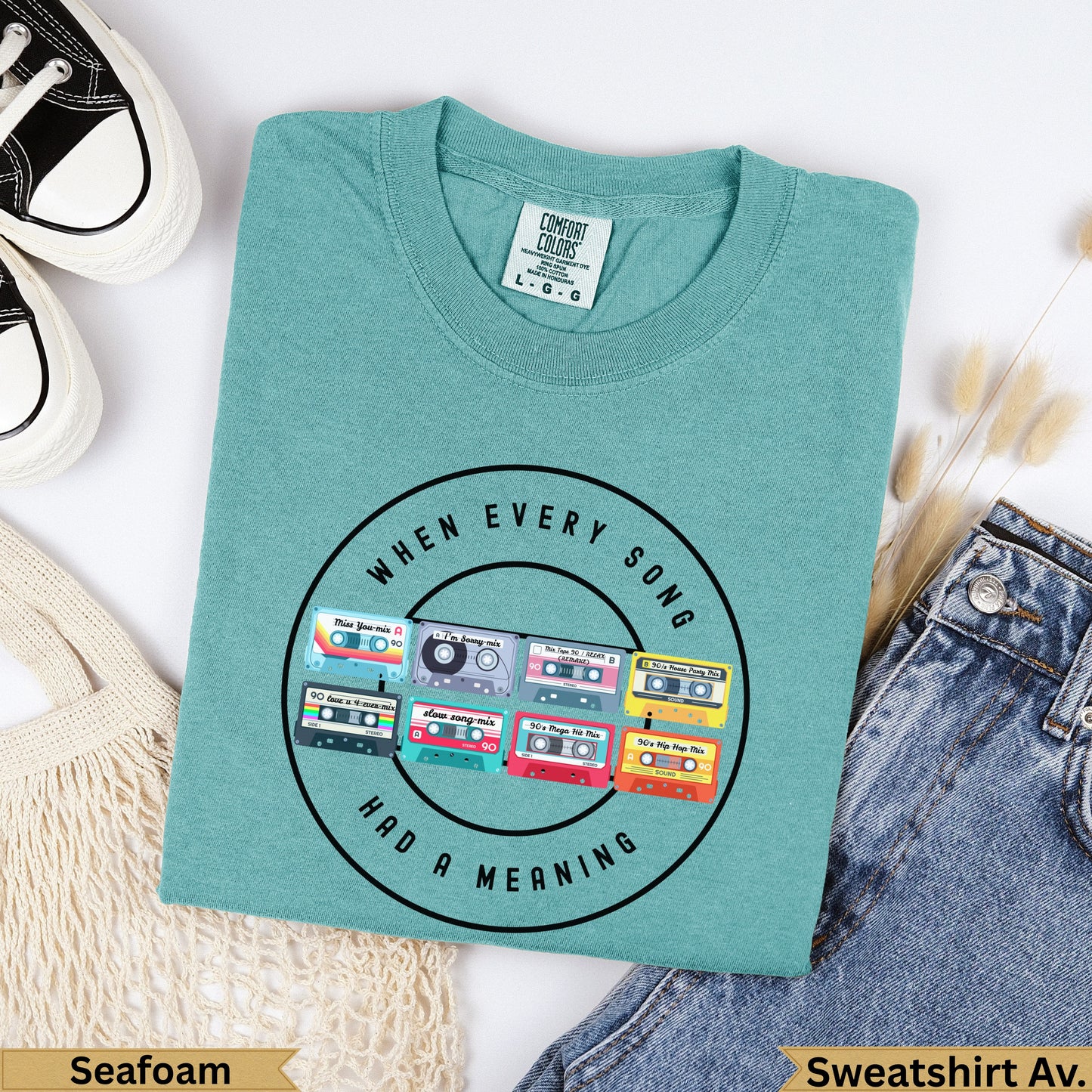 Seafoam sweatshirt with vintage 90s cassette tapes and text "When Every Song Had A Meaning".