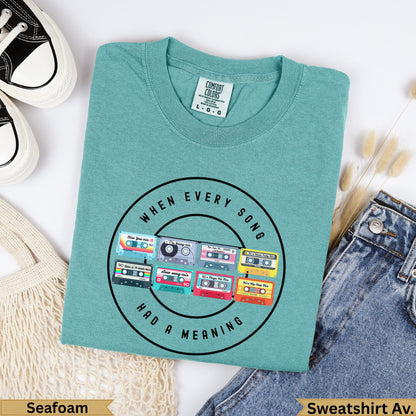 Seafoam sweatshirt with vintage 90s cassette tapes and text "When Every Song Had A Meaning".